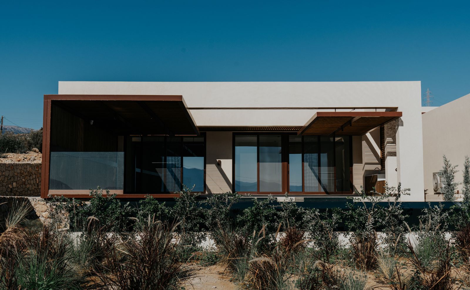 Private Blue villa terrace and infinity pool overlooking the Aegean