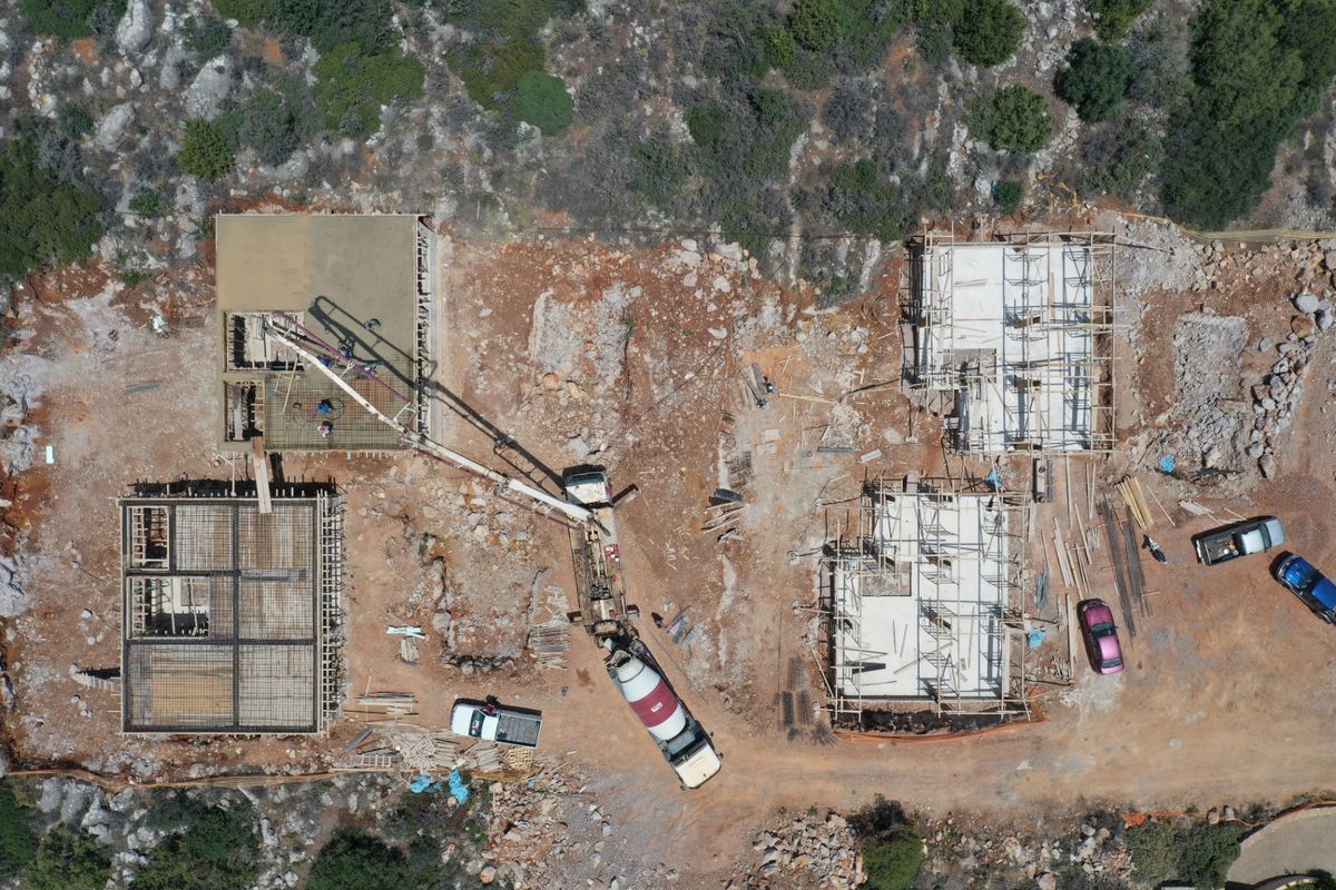 Top-down drone view of the Private Blue villas under construction