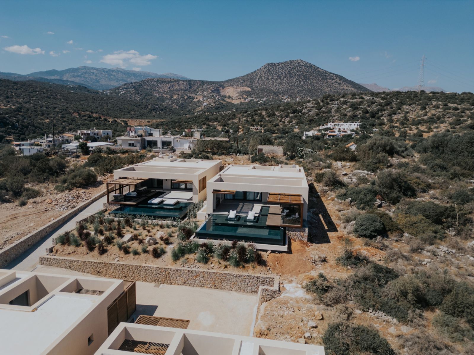 Aerial view of the Private Blue villa complex above Ammoudara