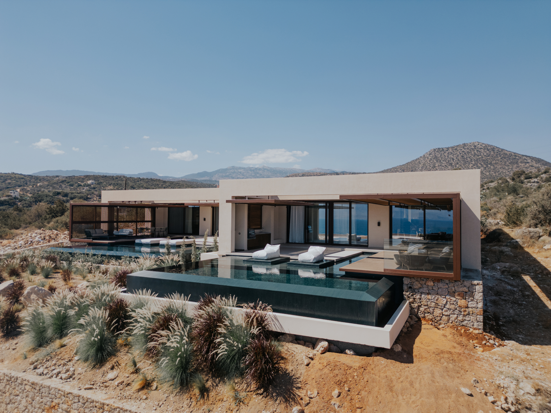 Private Blue villa infinity pool overlooking the Aegean
